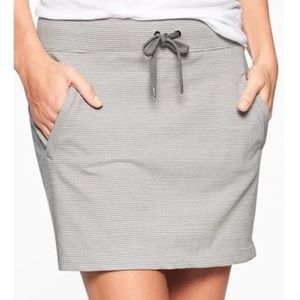 Athleta skort. Size large. Grey and white stripes.